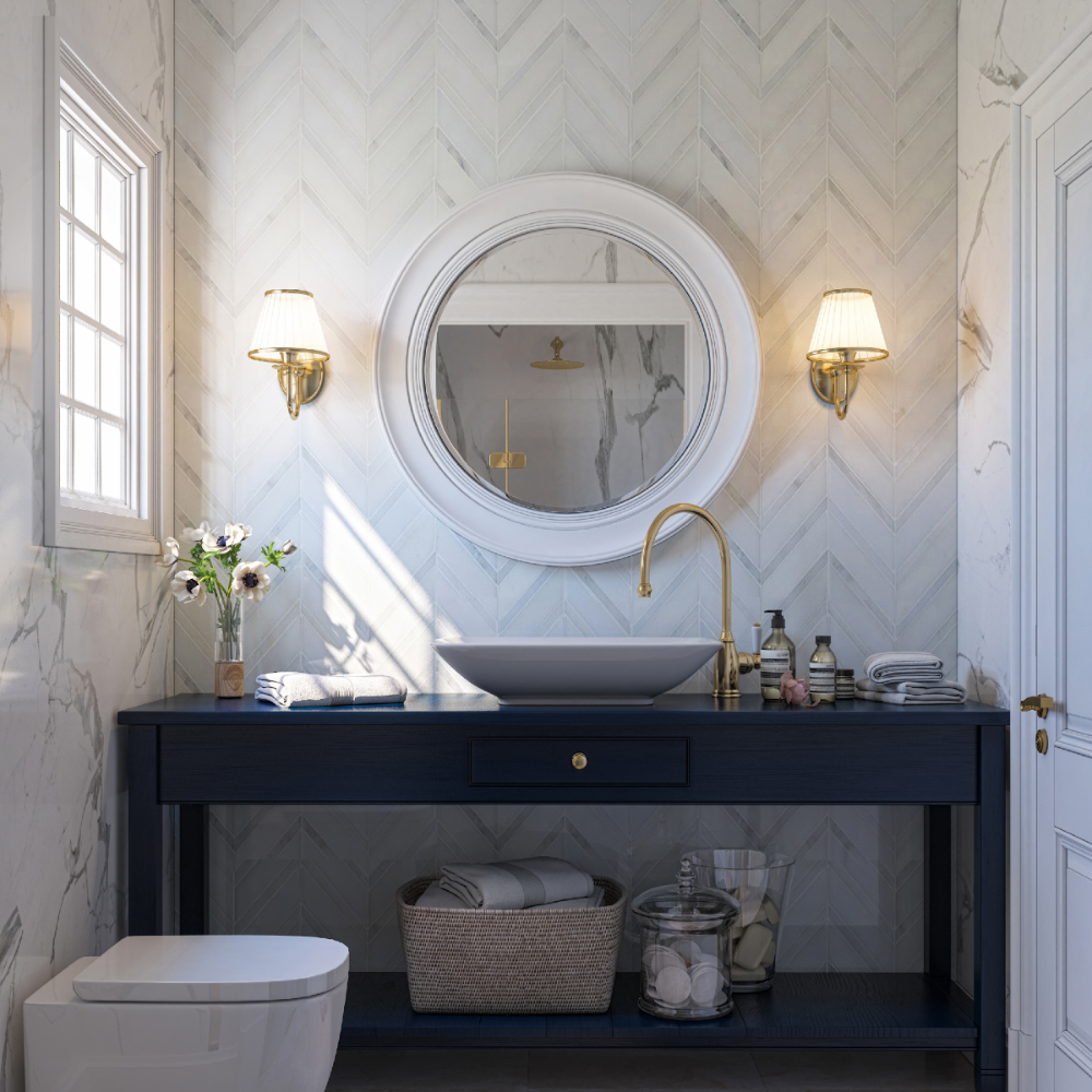 Bathroom with a dark blue vanity, round mirror, and decorative elements.
