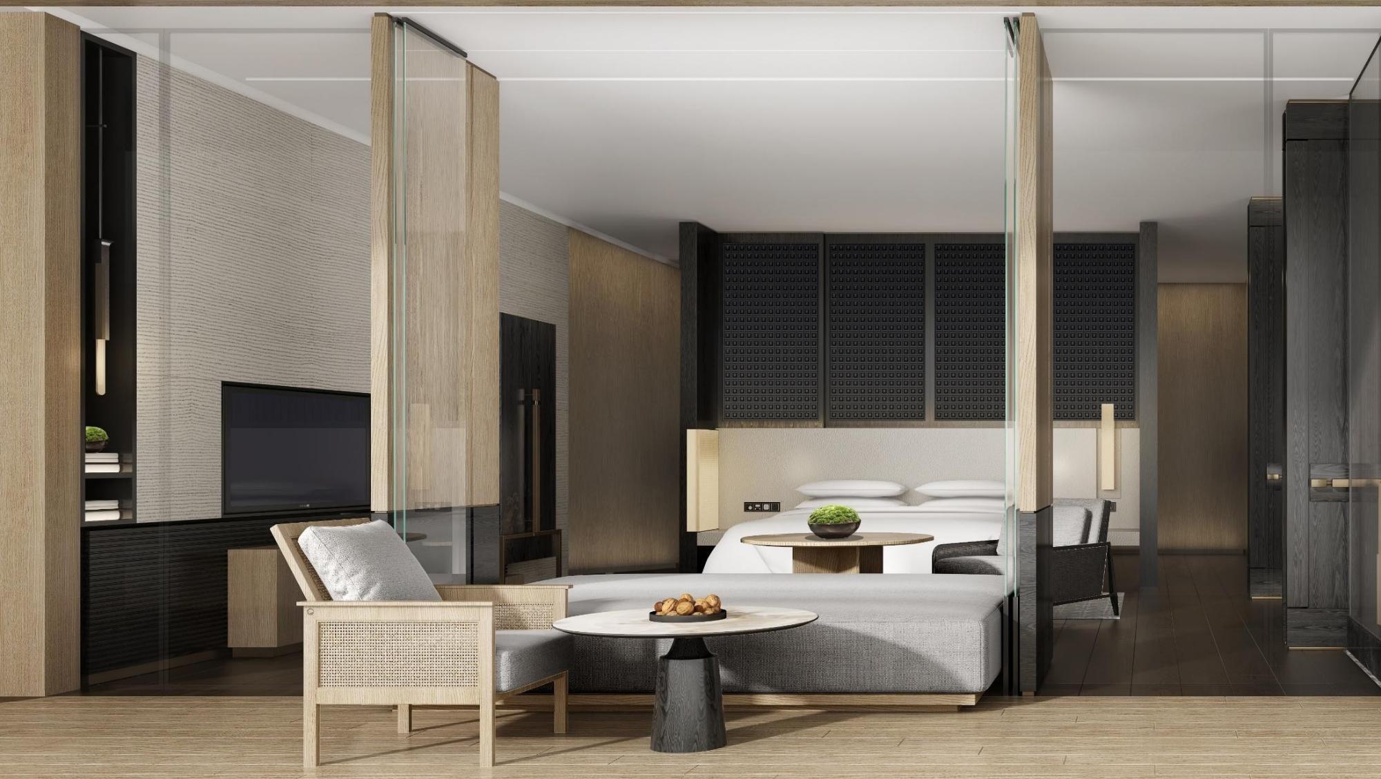 Modern bedroom with glass partition, bed, and furniture.