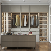 Modern walk-in closet with gray cabinets, shelves, and a dresser.