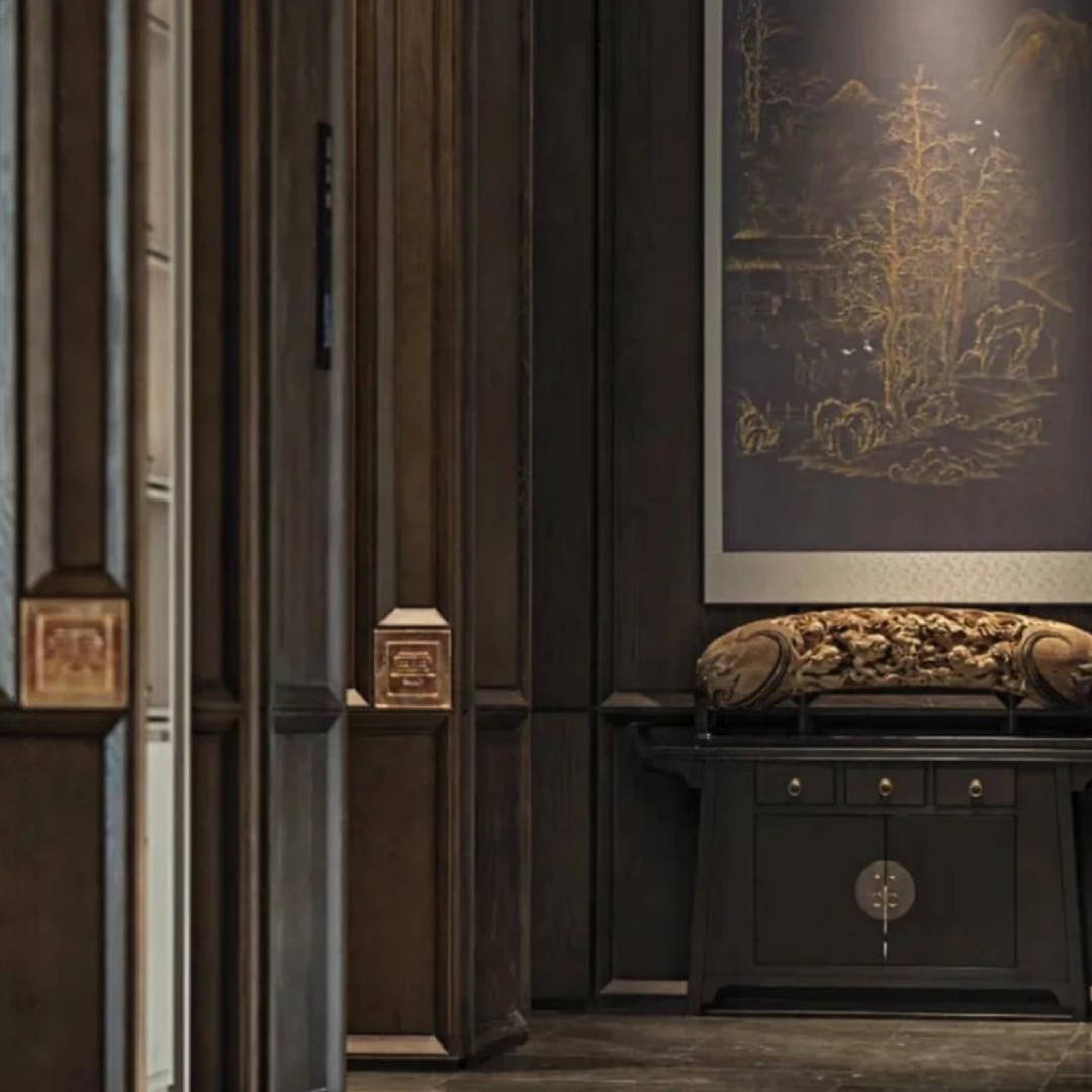 Decorative interior with wooden paneling and a framed artwork on the wall.