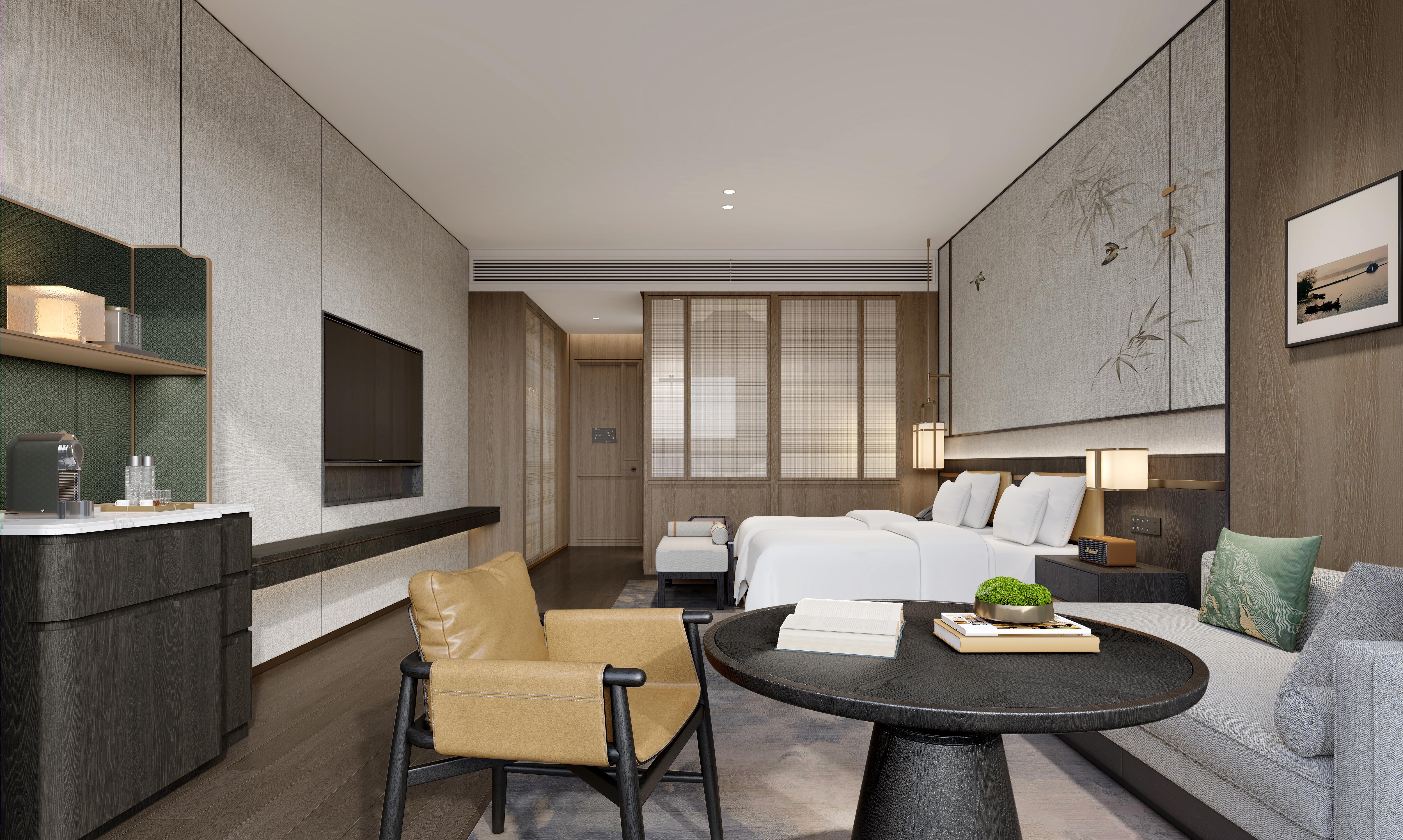 Modern bedroom with a bed, chair, and table.