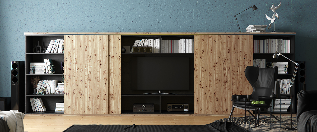 Wooden entertainment center with TV and shelves against a blue wall.