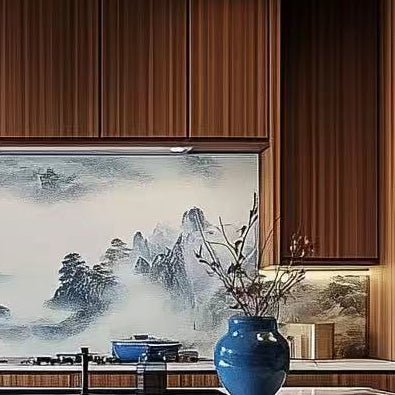 Modern kitchen with wooden cabinets, marble countertop, and decorative elements.