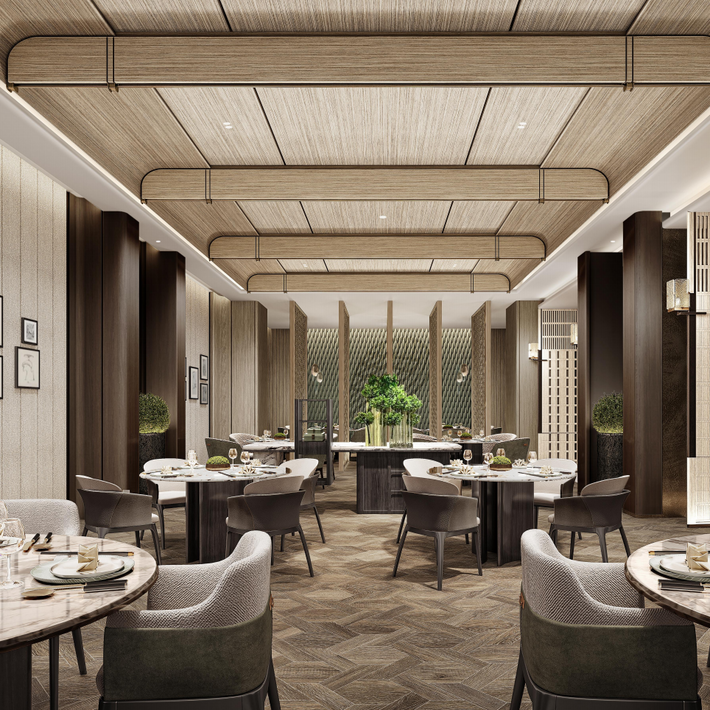 Modern restaurant interior with tables, chairs, and decorative elements.