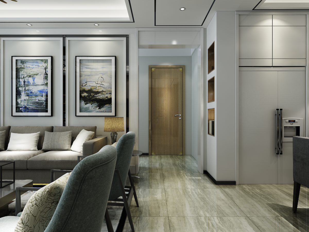 Modern living room with gray sofa, abstract art on the wall, and a door leading to another room.