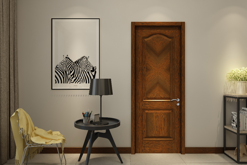 Wooden door in a room with a lamp, chair, and framed picture on the wall.