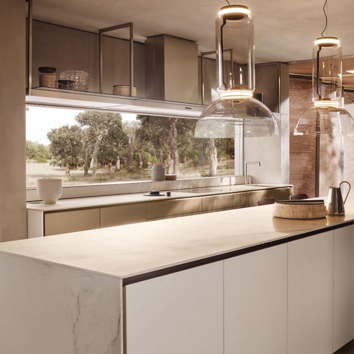 Modern kitchen with a large island and large windows