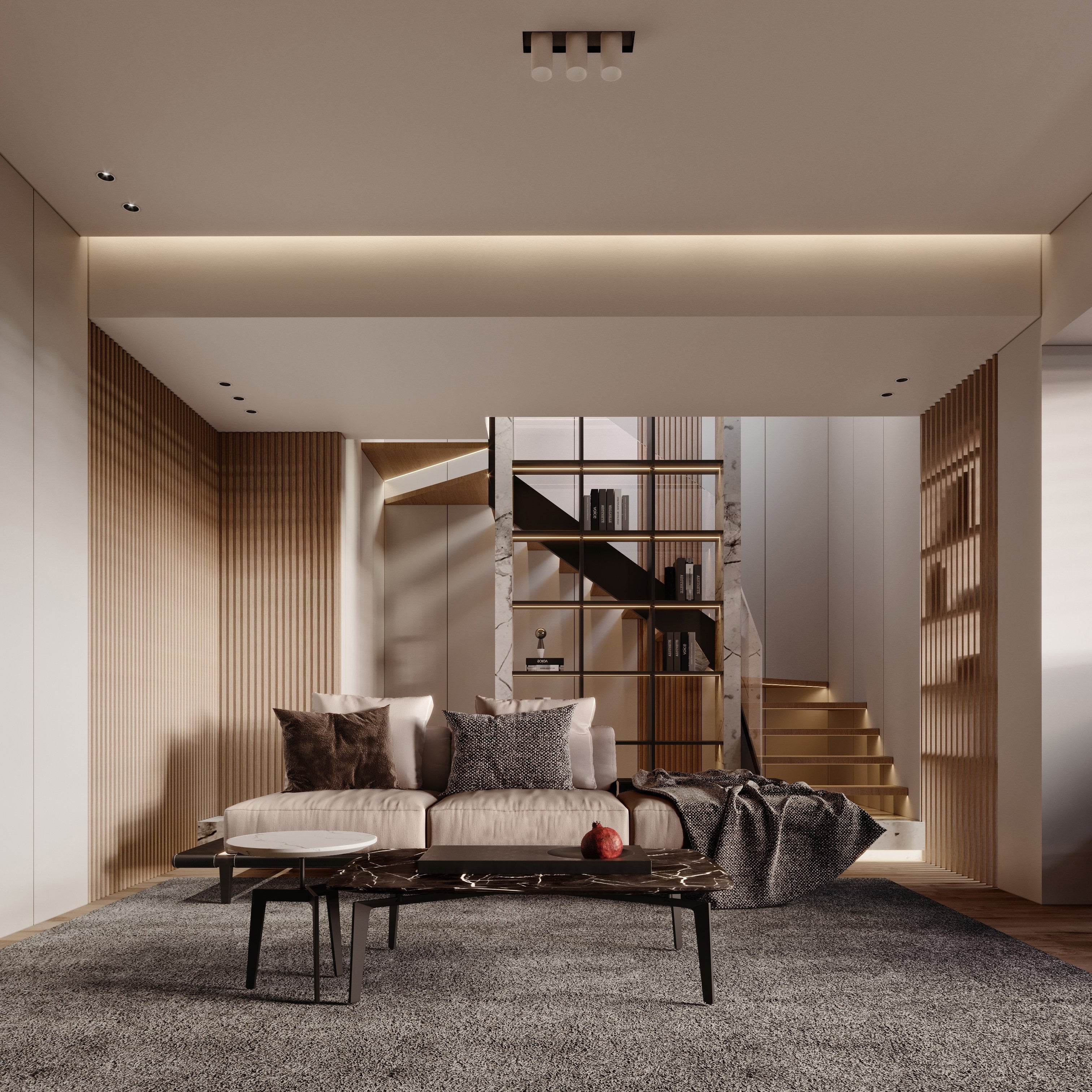 Modern living room with a sofa, coffee table, and bookshelf.