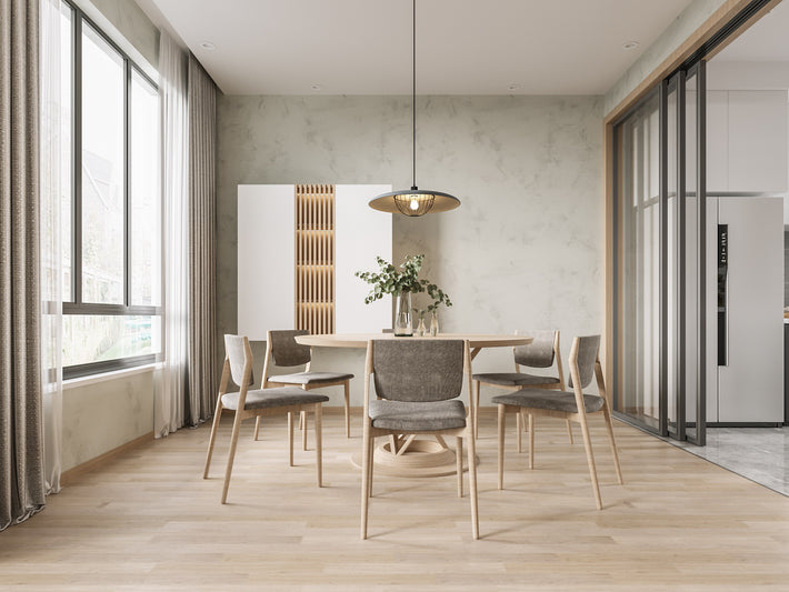 Modern dining room with wooden table and chairs near a large window.