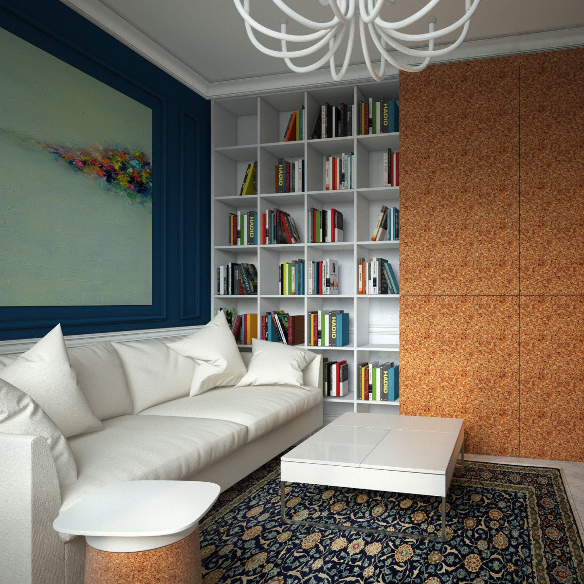 Modern living room with white sofa, bookshelf, and decorative wall art.