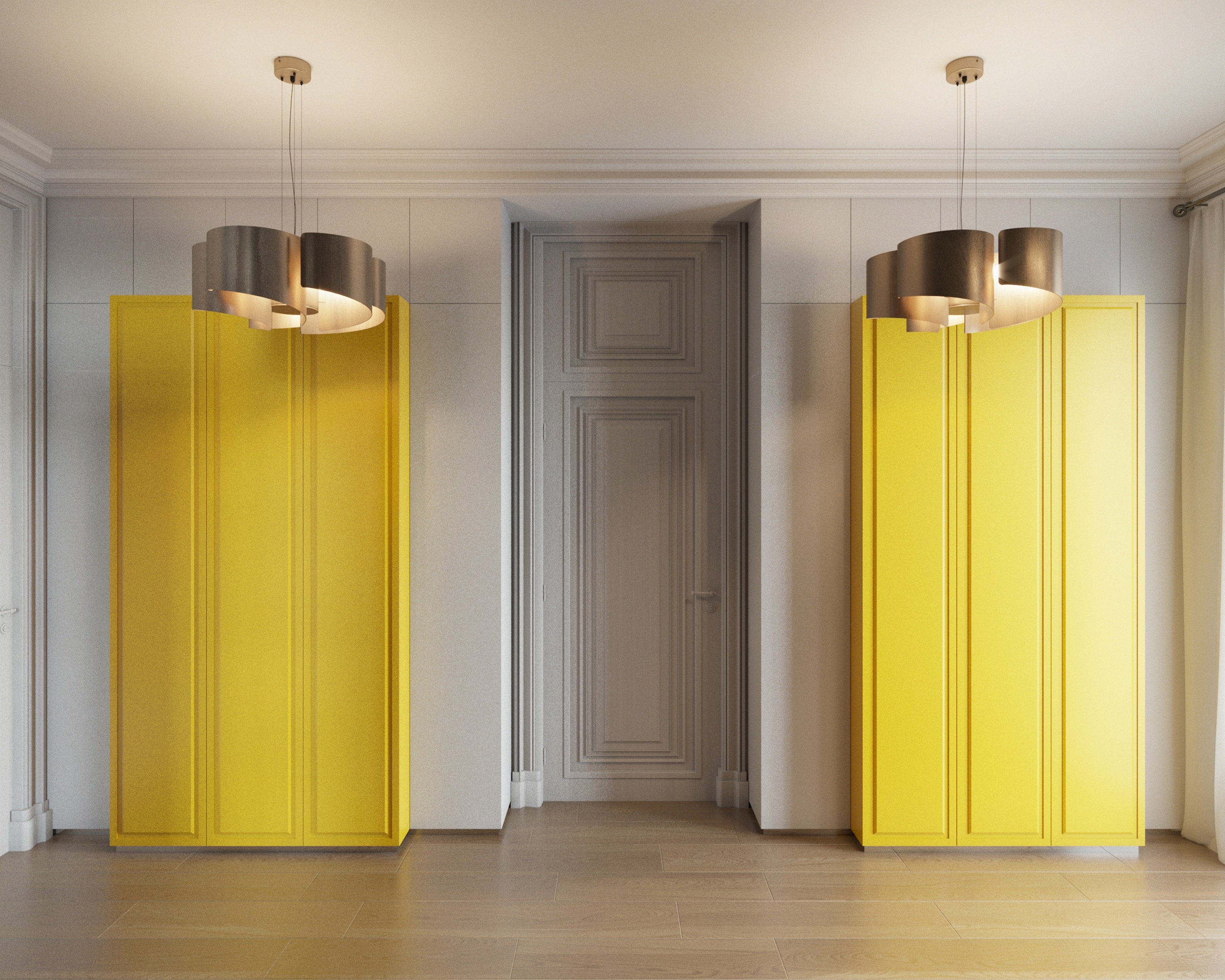 Two yellow cabinets with silver lights on a white wall.