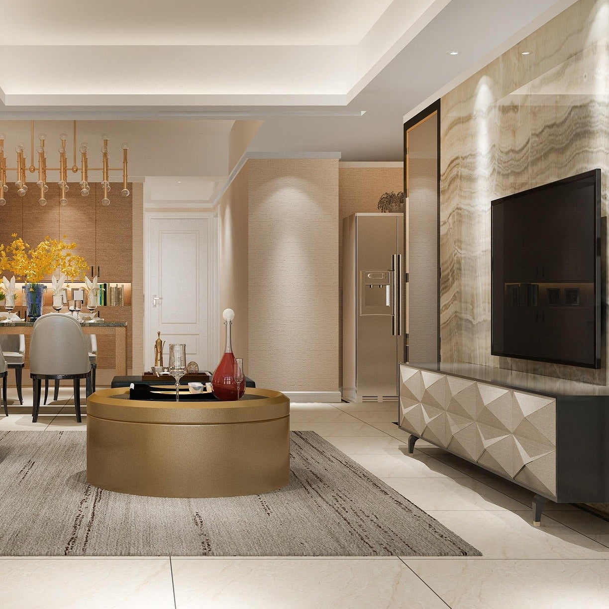Modern living room with gray sofa, round coffee table, and marble wall.