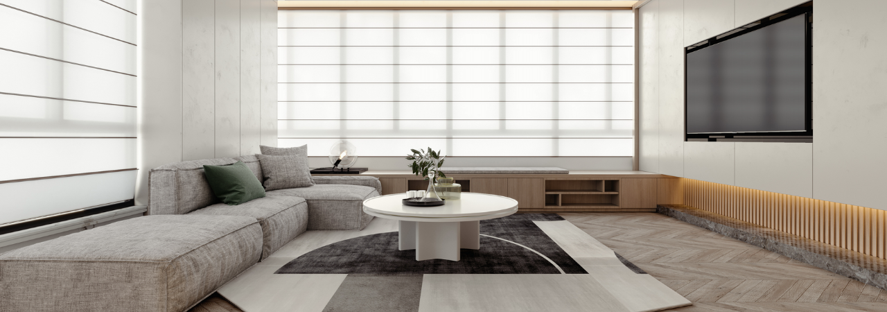 Modern living room with a sectional sofa, coffee table, and TV.